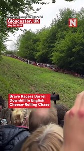 Brave Racers Barrel Downhill In English Cheese-Rolling Race