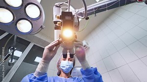 Laser correction for vision. Patient under surgical microscope