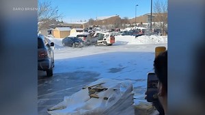 Video shows man go on rampage with Bobcat tractor in Nebraska parking lot