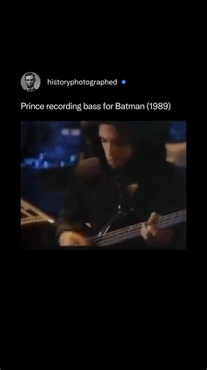 Prince recording the bass track for his song "Partyman" at Paisley Park Studios during the creation of the 1989 Batman soundtrack album. The clip showcases his talent as a multi-instrumentalist who played virtually every instrument on the entire record in just six weeks. Credit: Warner Bros. | History In Pictures