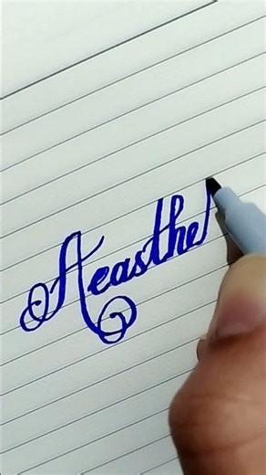 "Aesthetic" in Cursive writing#Calligraphy#Cursive Lettering#ytshorts #viral #abcd #reels