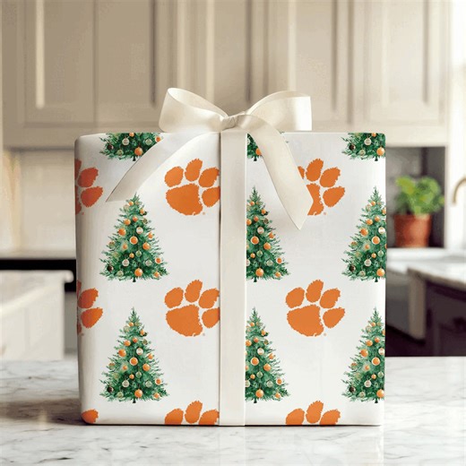 Tiger Roar in Every Fold Celebrate Clemson pride with officially licensed Clemson University wrapping paper. Perfect for game day gifts, grad celebrations, or birthdays—wrapped in bold orange and purple energy. Shop Clemson Wrapping Paper now: https://aspenandarlo.com/collections/clemson-university | Aspen & Arlo