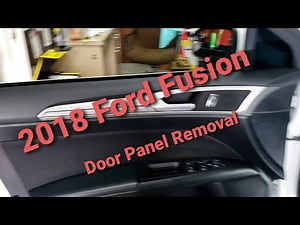 How to disassemble the door panel on a Ford Fusion
