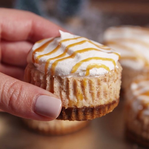 These Mini Eggnog Cheesecakes have the most brilliant crust hack you'll ever see. Full recipe: http://dlsh.it/KeJEypo | Delish