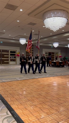 As the JROTC Military Ball commences, our Color Guard proudly presents the colors, accompanied by the captivating performance of the National Anthem by the talented Mr. Hyppolite, igniting the room with a sense of unity and patriotic spirit | Scarborough High School-Houston ISD