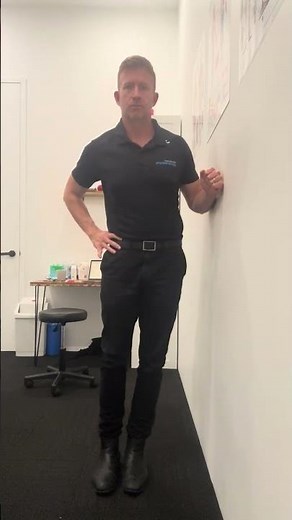 Side Glide In Standing - Exercise to correct lateral shift or list. Pain free side towards the wall