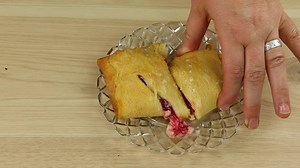 1K views · 34 reactions | Cream Cheese Cherry Turnovers  ❤️ Recipe Here: https://www.livingonadime.com/crescent-roll-recipes/ ❤️ 25% off NOW! ❤️ Quick and Easy Recipes! ❤️ Dining On A Dime Cookbook https://shop.livingonadime.com/ | Living On A Dime | Facebook
