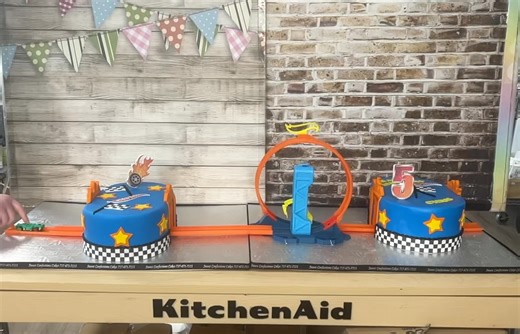 This cake isn't just for eating; it's for racing! Dive into a world where the dessert transforms into a playful racetrack, proving that celebrating can be just as thrilling as the race itself. | Sweet Confections Cakes | Facebook