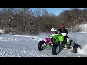 Honda TRX 450r snow ridding WITH PADDLE TIRES (Hillclimbs Don't Work)