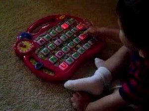 Little guy plays with Alphabet town~1