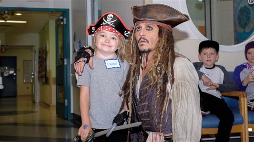 Johnny Depp visits children's hospital dressed as Captain Jack Sparrow