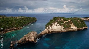 Nusa Penida Island, Bali, Indonesia. Timelapse Rocks in the Atuh Beach. Aerial Hyperlapse of Famous Bali Tourist Spot on Nusa Penida Island. Travel and Adventure