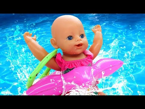 Baby Born doll plays in a ball pit & toy slide. Pretend play with toys. Baby dolls videos for kids.