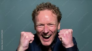 Beautiful man screaming in front of a background