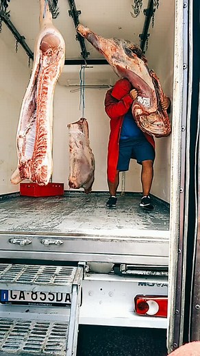 Industrial Meat Handling Techniques in A Butcher Truck