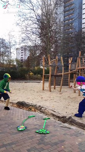 Playful Sword Fighting in Colorful Costumes