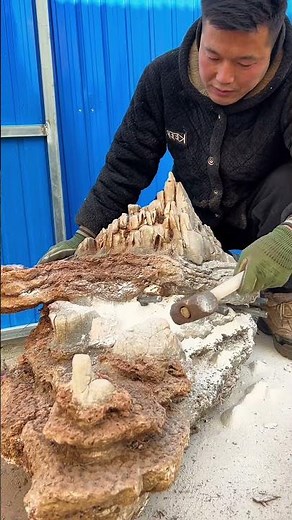 Intricate Stone Carving: Shaping a Miniature Mountainscape from Natural Rock