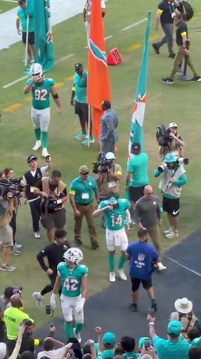 Dolphins interim GM Champ Kelly dapping players up after their final home game of the season | Miami Dolphins Zone