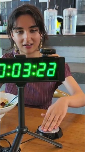 Can She Stop the Timer at Exactly 5 Seconds?