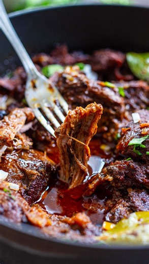 Here's an incredibly delicious recipe for Barbacoa, resulting in the most flavorful, meltingly tender, fall-off-the-bone meat. Make it with beef or lamb and slow-roast it in your oven, use a slow cooker or your Instant Pot. While visiting Oaxaca, Mexico, we experienced the most tender, flavorful Barbacoa! After speaking with the chef, who shared a few tips, I couldn’t wait to come home and replicate his method. This Oaxacan version has a secret ingredient that we learned about, which we believe 