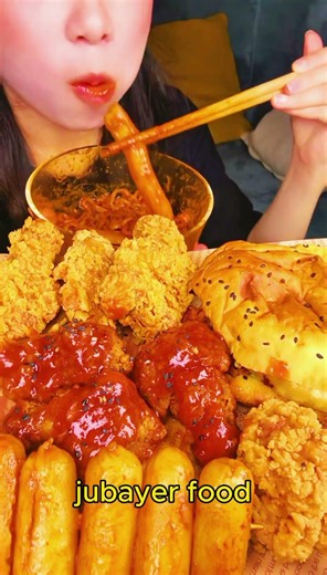 Fried chicken burgers, cola, spicy chicken noodles, a stick of oyster, and fragrant rice balls