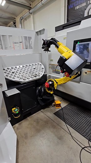 What should we name the new Robot? 🍒 AWR robot cell loading our new Okuma LB3000 MYW Lathe. This stock to under 5 minutes to set up for loading. 🤯 #robot #machining #cncmachining #lathe #space