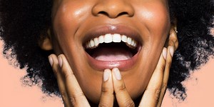 The Internet Swears By Tongue Scraping. Here's What Dentists Think