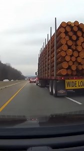 Log Truck Spills Massive Load on Highway Huntington, West Virginia — November 14, 2024 Commuters on a busy interstate witnessed a harrowing scene Tuesday afternoon when a logging truck tipped over, spilling massive tree trunks across multiple lanes of traffic. The incident, captured on a dashboard camera, shows the moments leading up to the rollover as the vehicle’s heavy cargo began to sway precariously. Passengers in a trailing car can be heard expressing concern about the stability of the loa