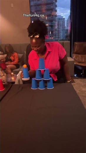 Fun Cup Stacking Challenge with a Playful Friends