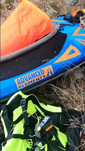 Advanced Elements AdvancedFrame Expedition Elite, PFD and sea kayak on land during winter trip