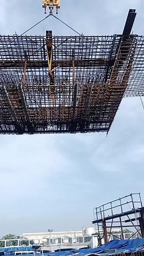 Steel Framework Installation by Crane at Construction Site