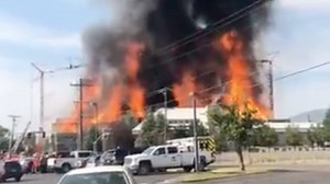 Massive flames from construction fire in Millcreek, Utah