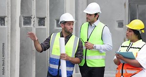 Obese female and hispanic male site engineers. Ethnic diversity worker people, Success teamwork professional engineering people in hardhat safety helmet meeting at Prefabricated concrete walls factory