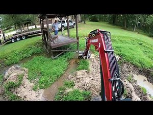 Dredging The Cove Of A Pond