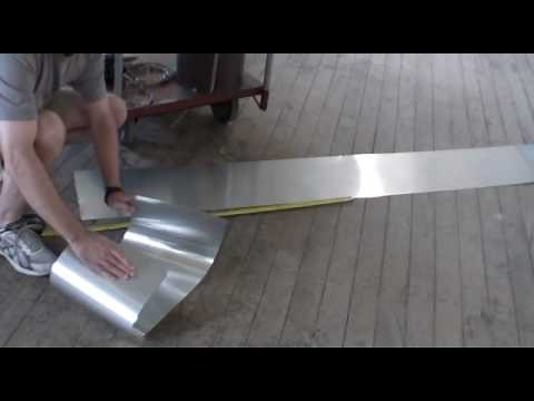 Temporary muffler repair patch with aluminum sheet