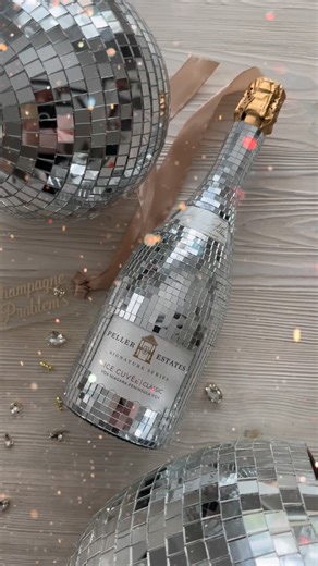 Melany Afara | A little New Years inspo coming your way! I made this last year using @dollaramafindsca disco 🪩 stickers and @pellerwines ice cuvée. ✨ .... | Instagram