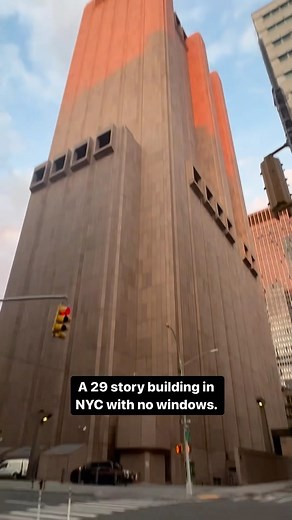 Architecture & Design on Instagram: "Ever wonder why this huge building has no windows? Built in 1974 during the Cold War, the 29-floor building was intended to be a fortress to “house long lines telephone equipment and to protect it and its operating personnel in the event of an atomic attack.” Its solid structure is designed to withstand a blast and reportedly would have been able to turn into a “self-contained city” for two weeks, providing food, water, and living space for occupants in the e