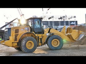 Cat 962M Wheel Loader Filling Trucks with Sand