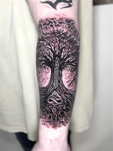 TREE OF LIFE (Black & Grey) 🌳 Crown = energy & growth, roots = foundation, infinity = the endless movement forward. Want your own custom version (runes/symbols/composition shaped to your anatomy)? DM me — we’ll build an индивидуальный design from scratch. ✍️ #tattoo #tattooartist #blackandgrey #treeoflife #norse