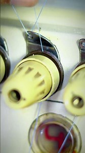 installing thread on overlock sewing machine