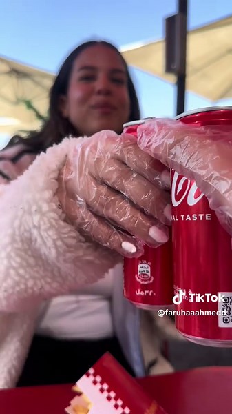 Enjoying Delicious Food with Ice Cold Coke