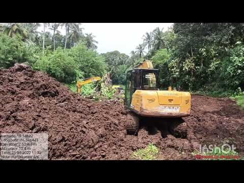 Desiltation with excavators at river banks