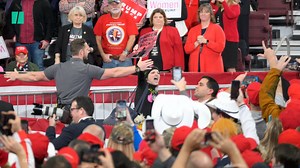 President Donald Trump mocked a campaign rally security guard for not being rough on a protester who was being escorted out. | HuffPost Politics