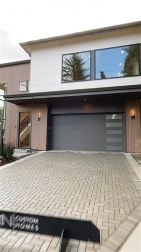 MN Custom Homes on Instagram: "A home designed for how you live today - refined, functional, and beautifully crafted. Located in Seattle’s Maple Leaf neighborhood ✨ This home offers carefully curated interiors, an open living and kitchen space, a guest suite with kitchenette and private entry, a versatile bonus room, and a covered outdoor retreat with an expansive backyard. Schedule your tour today by heading to our link in bio! . . . #MNCustomHomes #SeattleHome #NewSeattleHome #NewConstruction 