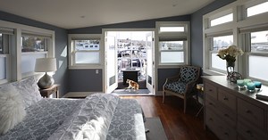 A first-time homeowner’s custom houseboat makes waves on HGTV, and in its Seattle marina