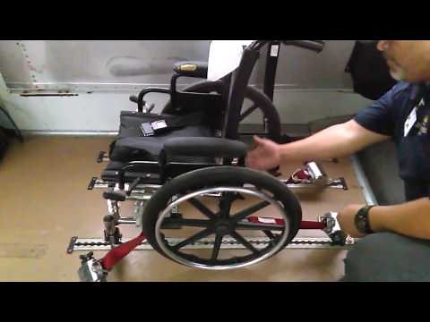 School bus wheelchair securement using the 7-point system. CDL.