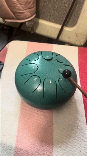 ￼ How to use a handpan or a steel tongue Drum