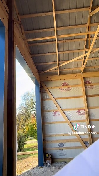 Blue Roof…#polebarn #postframe 30x32 x14' post frame building with the following specifications: Pre-Engineered wood trusses 4' on center 4/12 pitch Site is presumed level and 4:11 stone backfill for pole holes 4.5x5.5 3-Ply laminated posts with treated bottom Concrete pad per post hole Treated 2x10 skirt boards SPF wall girts and roof purlins Double top girt truss carrier, vapor barrier on roof with continuous ridge vent 29 gauge Painted Galvalume Steel Siding and Roofing Housewrap on sidewalls