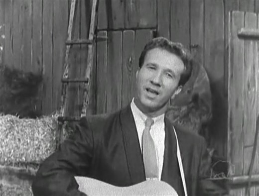 "Singing the Blues" was a pivotal song in Marty Robbins' career, marking his first number one hit on the country charts in 1956. The song, written by Melvin Endsley, stayed at the top of the Billboard C&W Best Sellers chart for 13 weeks and crossed over to the pop charts, peaking at number 17. | GatorRock