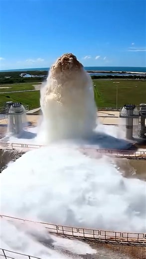 World in Motion 🕹️ on Instagram: "Every time NASA launches a rocket, it releases nearly half a million gallons of water in just a few seconds. This isn’t done to cool the engines but to shield the rocket from the intense sound they produce. Rocket engines can generate more than 180 decibels—powerful enough to crack concrete or damage the rocket itself. NASA’s Sound Suppression Water System floods the launch pad to absorb this acoustic energy, instantly turning the water into steam. By reducing